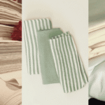 Soft folded muslin cloths for baby laid out on a nursery shelf