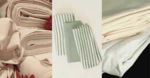 Soft folded muslin cloths for baby laid out on a nursery shelf