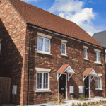 House for lease in the UK with a rental sign outside
