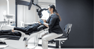 Dentist in Leamington Spa discussing treatment options with a patient at Andrew Lee Dental Practice